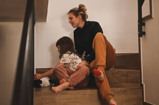 istock Family playing with domestic cat. 1822149296