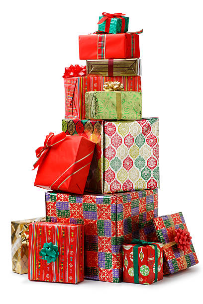 Christmas Presents A stack of Christmas presents. Clipping path included.To see more holiday images click on the link below: stacked presents stock pictures, royalty-free photos & images