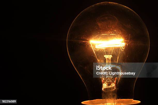 Light Up The Dark — стоковые фотографии и другие картинки Лампа накаливания - Лампа накаливания, Чёрный фон, Без людей