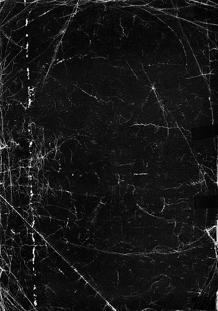 an old black paper texture background - beschadigd stockfoto's en -beelden