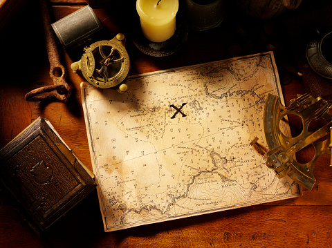 Old treasure map isolated on white background