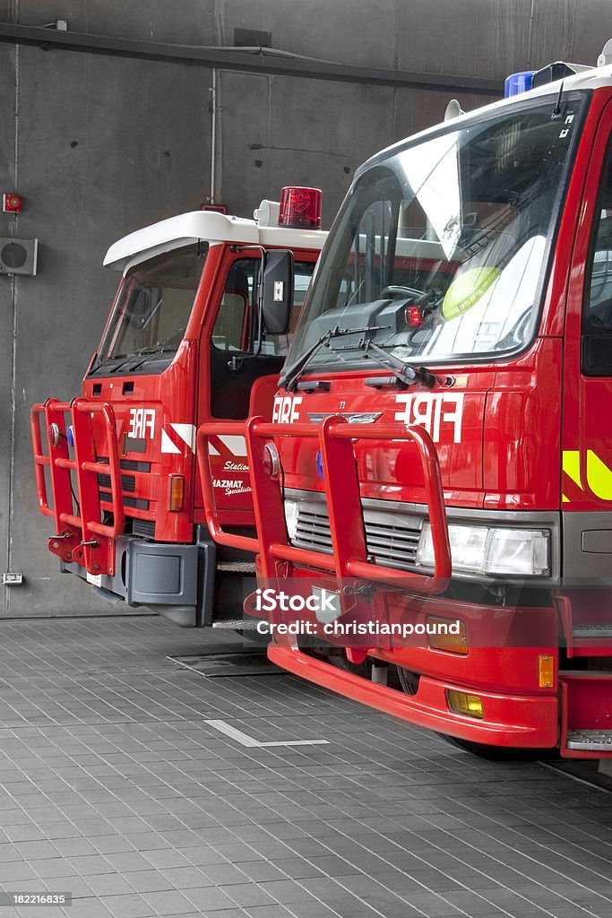 Two Fire Trucks Two fire trucks in a three-quarter perspective.Related images: Accidents and Disasters Stock Photo