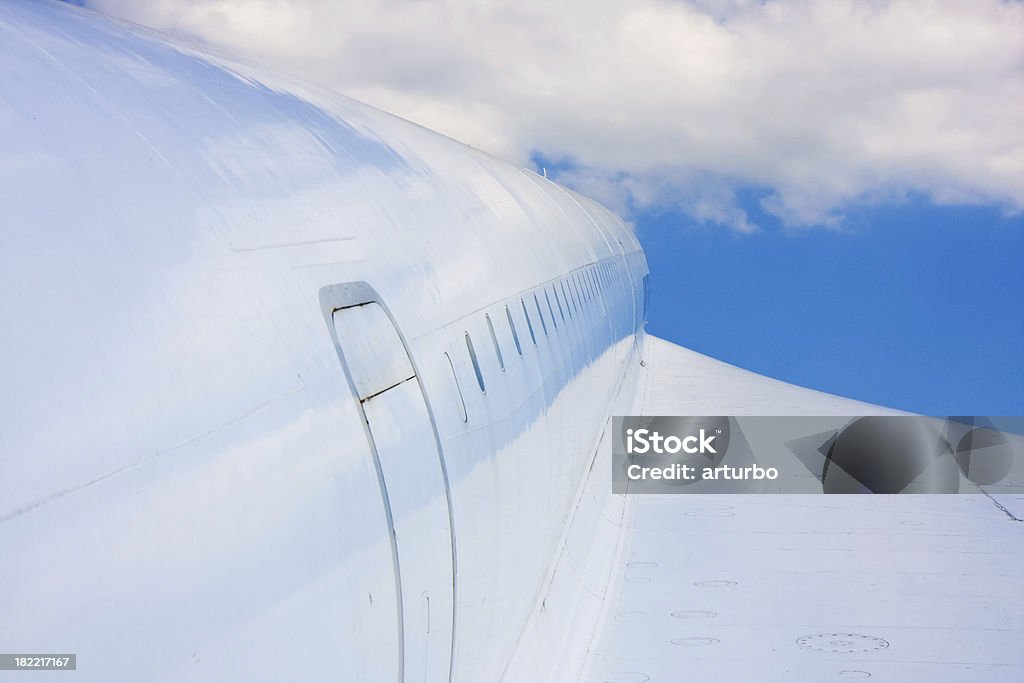 Avión en el cielo azul - Foto de stock de Abstracto libre de derechos