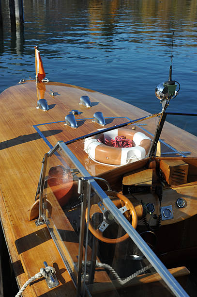 istock wodden exclusive boat on a lake in evening sun 182217172