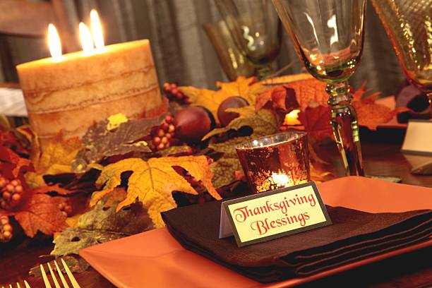 istock Holiday: Thanksgiving Table with candle and leaves 182217272