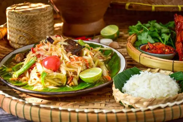 Sticky rice, papaya salad, Som Tam , thai food, isan food,Thai isan kitchen