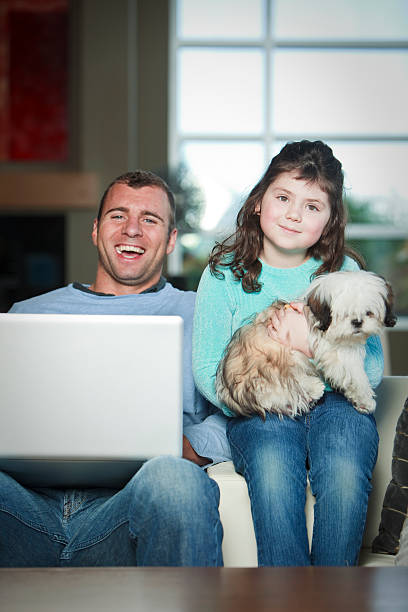 istock Father and daughter. Plus dog 182217698