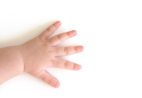 Hand of a baby on a white surfaceRelated pictures: