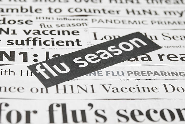 istock H1N1 flu headlines (pandemic and vaccine) - III 182218463
