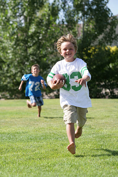 istock Boys Playing Football 182218684