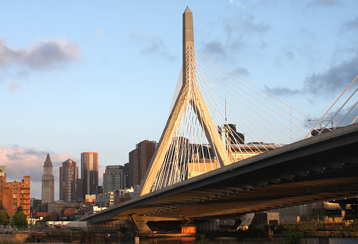 Zakim Bridge over the Charles River at dusk. The Leonard P. Zakim Bunker Hill Bridge, is a cable-stayed bridge across the Charles River and was part of the Big Dig Project in Boston. The Big Dig, was the largest highway construction project in the United States. The Zakim Bridge is the widest cable-stayed bridge in the world. 