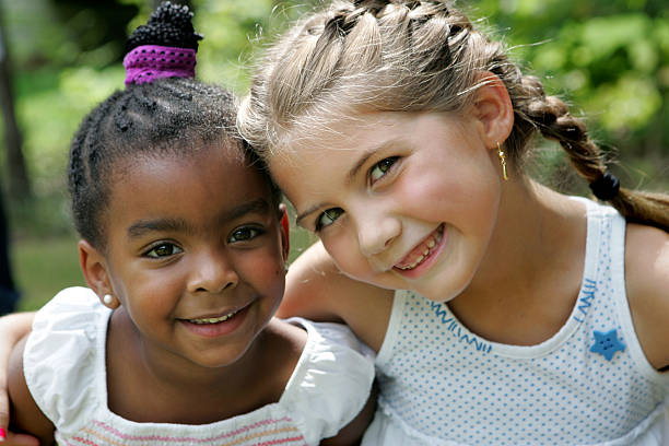 istock Two little girls smiling 182218791