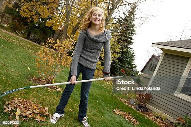 Girl Raking Leaves Stock Photo - Download Image Now - 14-15 Years, Adolescence, Autumn