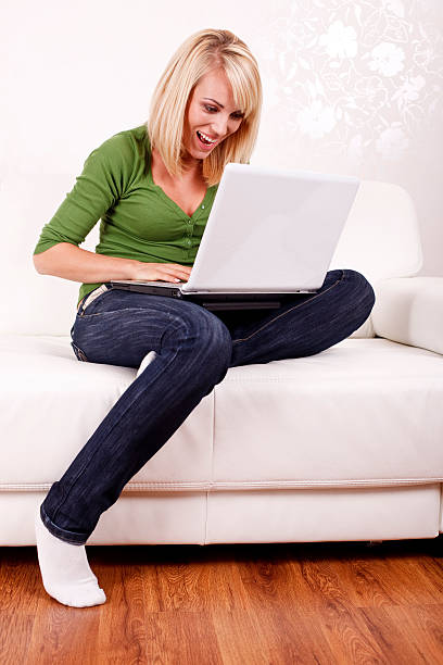 istock Beautiful girl relaxing on sofa 182219404
