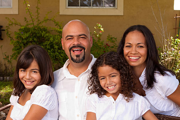 istock Hispanic Family Smiling 182219560