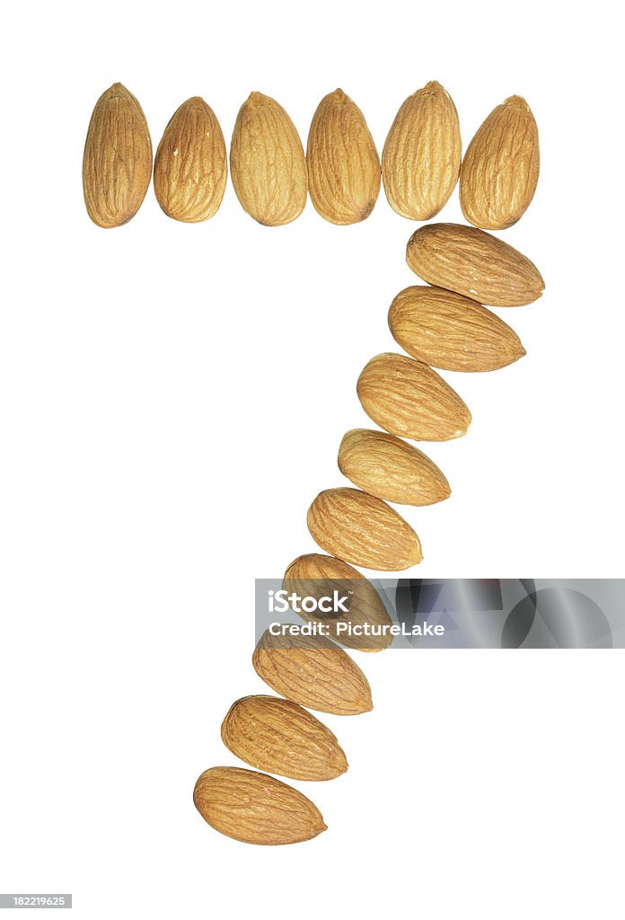 Almonds digit 7 Raw almonds arranged to form the digit 7. Almond Stock Photo