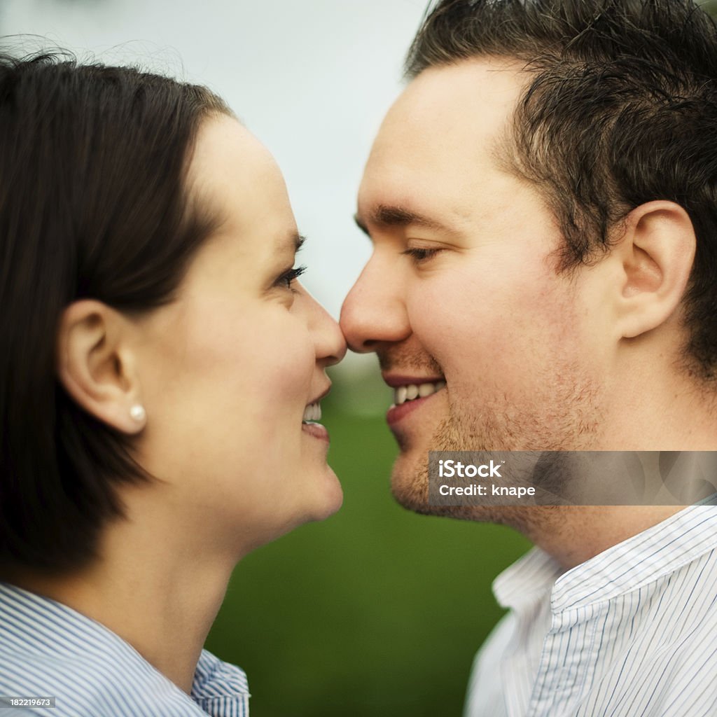 Cute couple outdoors Cuddling beautiful couple outdoors 20-29 Years Stock Photo