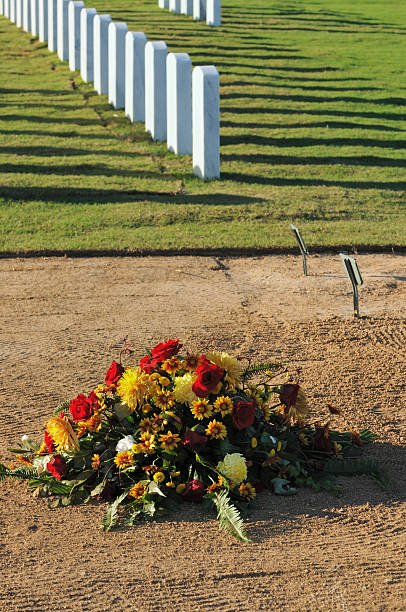 istock New grave in cemetery 182219780