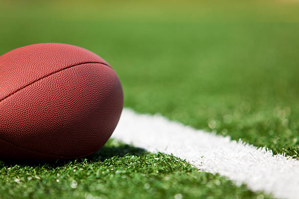 istock American football on the turf 182220013