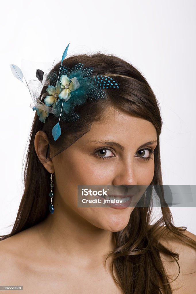 Model with Turquoise Hairpin Lovely model wearing a handmade hairpin with silk flowers and feathers in turquoise.Click to See More Jewelry & Accessories! Adult Stock Photo