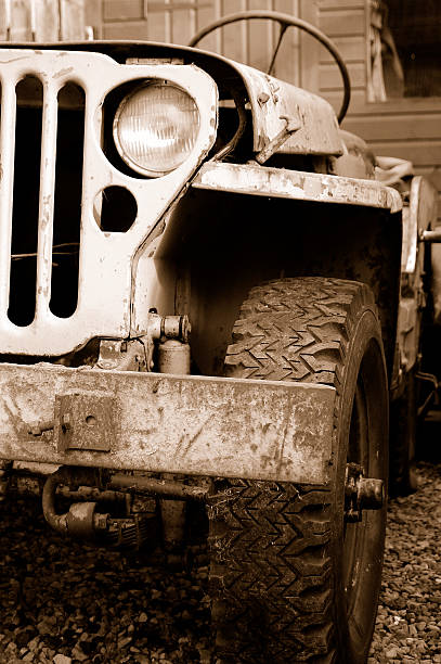 Old WW2 Jeep. An old WW2 Barn find Ford Jeep GPW waits to be restored to its former glory. jeep 4x4 off road vehicle world war ii stock pictures, royalty-free photos & images