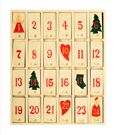 Christmas calendar 1 january. Christmas gift, fir branches, pine cones. Flat lay, top view. New Year decorations on a colored background.
