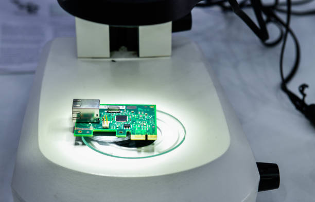 istock CMM machines for inspection high precision chip components on pcb board during working in industrial 1822207616