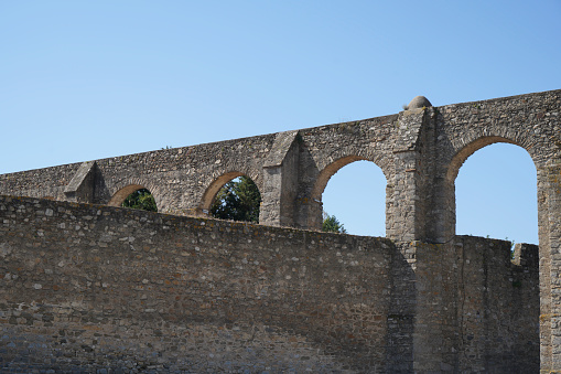 Aqueducts in Portugal are ancient water pipes reminiscent of stone bridges