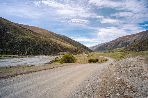 A dirt track winds its way through farmland in the Ahuriri Valley in North Otago, on New Zealand's South Island.