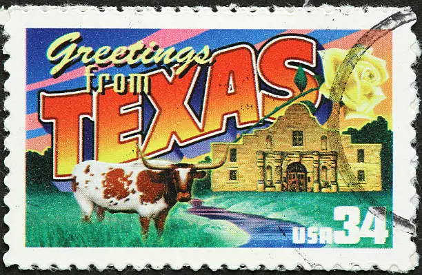 Texas longhorn and the Alamo on a postage stamp