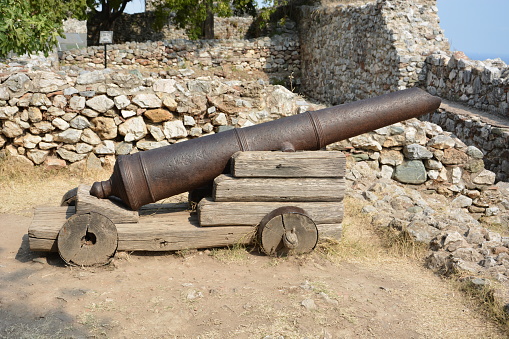 Historic cannon in ancient architecture - Castle and fortress