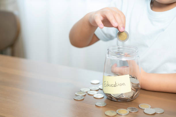 istock The girl is saving money for her education. 1822224742