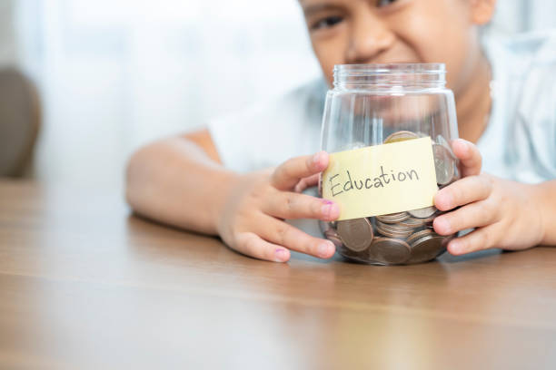 istock The girl is saving money for her education. 1822224744