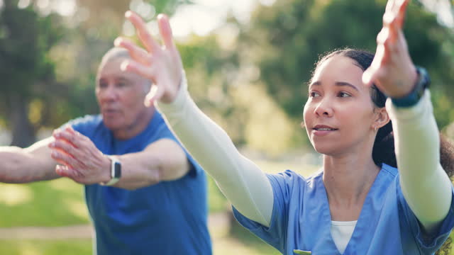 Woman nurse, tai chi and outdoor with senior man and caregiver with namaste and wellness in a park. Support, physical therapy and healthcare professional with physio, relax and retirement with care