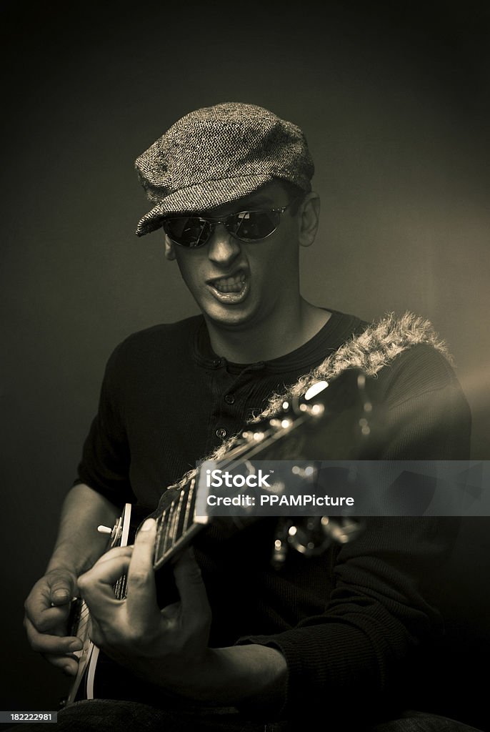 Rock guitarrista - Foto de stock de Color negro libre de derechos