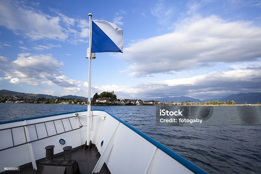 Lake Zurich little passenger ship at the lake Zurich with a flag from Canton ZurichClick here for more photos from Flag Stock Photo