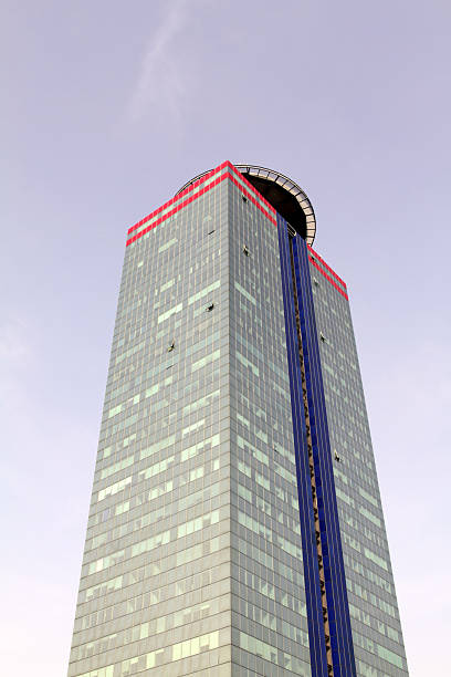 istock Modern skyscraper with heliport against winter sky 182223430