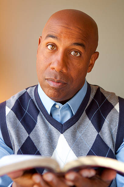 istock African American Man Reading 182223590