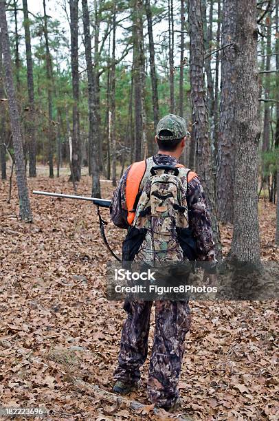 Hunter With Rifle Stock Photo - Download Image Now - Backpack, Hunter, Hunting - Sport