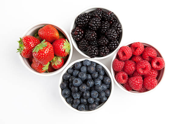 gemischte beeren - strawberry fruit isolated freshness stock-fotos und bilder