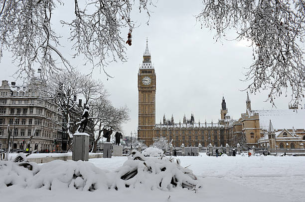 Big Ben in the snow "A White Christmas in LondonParliament Square, Westminster" winter wonderland london stock pictures, royalty-free photos & images