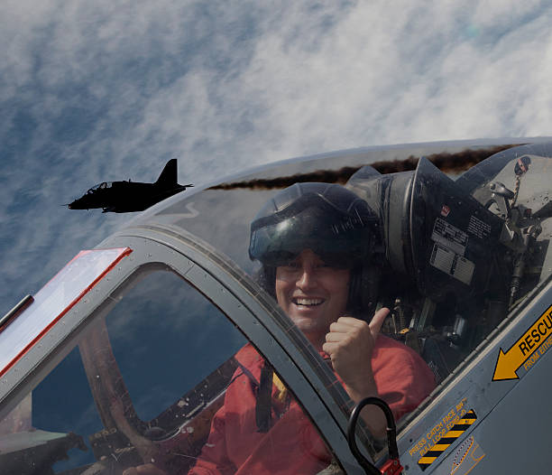 A pilot taking a selfie inside a fighter jet jet fighter pilot face guard sport stock pictures, royalty-free photos & images