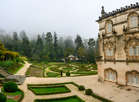 Luso, Portugal - Nov 09, 2023: The Bussaco Palace, also known as the Palace Hotel of Bussaco,   was commissioned by the monarch in the late 19th century and was converted into a luxury hotel in the 1910s.