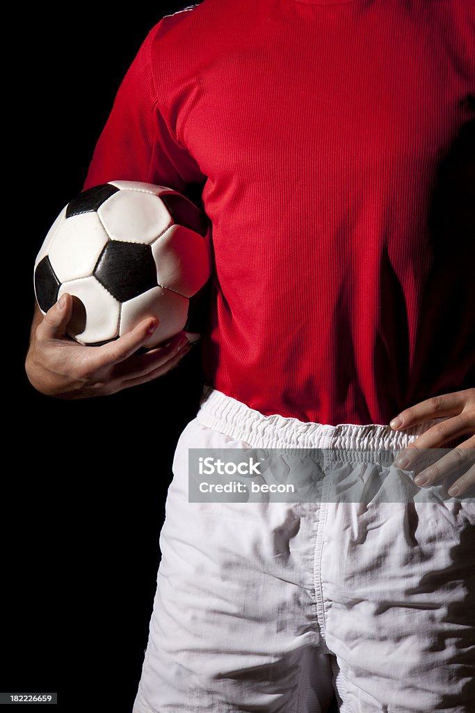 Jugador de fútbol de retención de bola - Foto de stock de Adulto libre de derechos