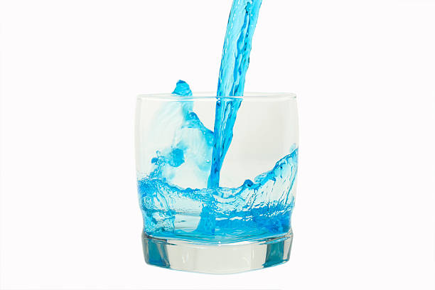 Pouring Blue Liquid stock photo