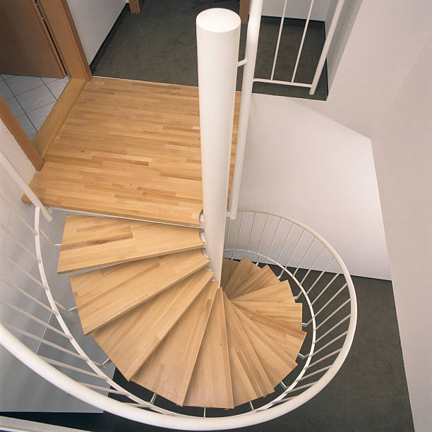 istock Wooden Circular staircase from above 182229125