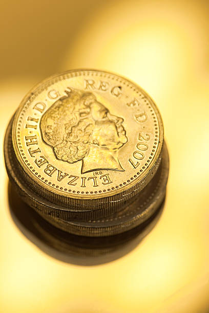 istock One Pound Coins In Gold 182229636