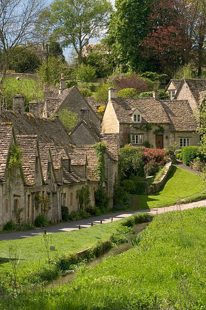 England, Gloucestershire, Cotswolds, Bibury, Arlington Row, National Trust owned former weavers cottages