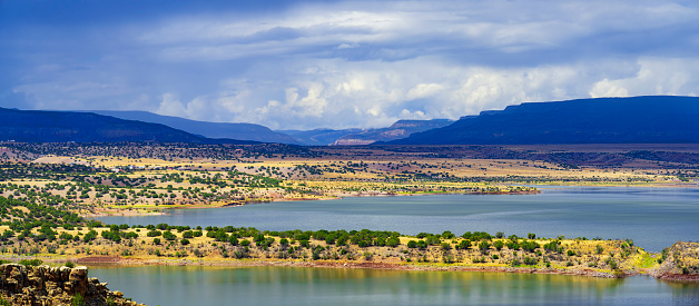 Abuquiu Lake, New Mexico,  in Summer with rain clouds in the background