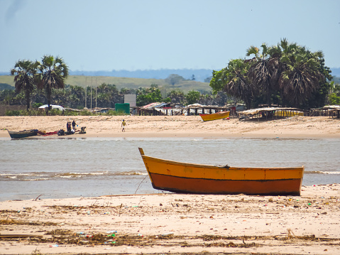 Old ship on the riverbank in Barra do Dande close to Dande, province of Bengo in Angola